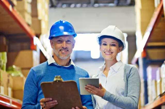 2 people with hard hats