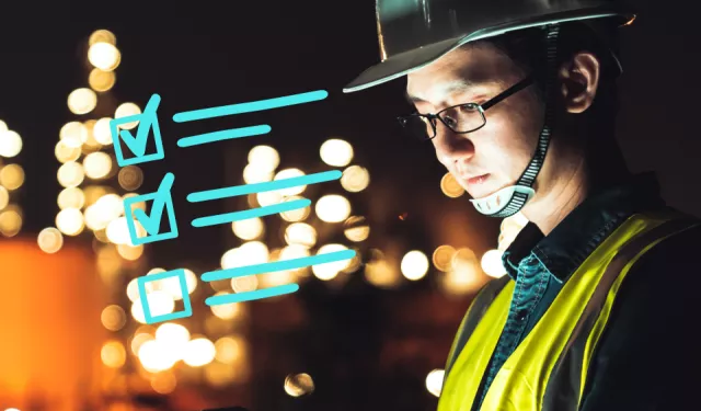 Man managing construction tasks on site